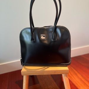 Dooney & Bourke Parasole Handbag. Classic smooth black leather satchel style.